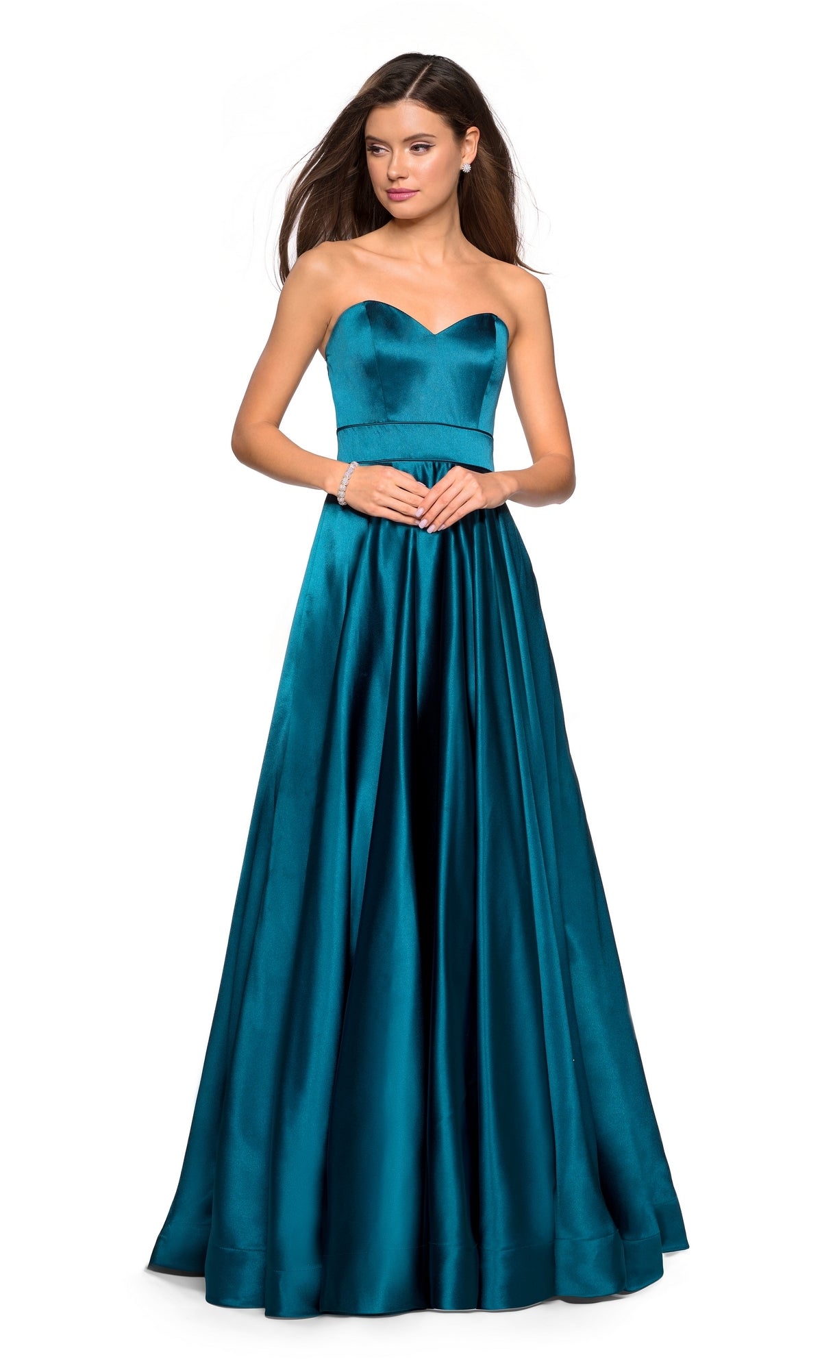 A woman poses against a white background in the La Femme 27506 Strapless A-Line Satin Prom Dress, featuring a fitted bodice and full, floor-length teal skirt for an elegant prom look.